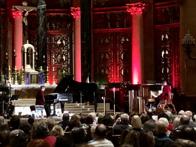 Cathedral Sacred Music Director and organist Chris Ganza (right) joins Steven for an improvisational interlude. It's a rare synergistic blending of the majestic pipe organ and Bosendorfer grand piano music.